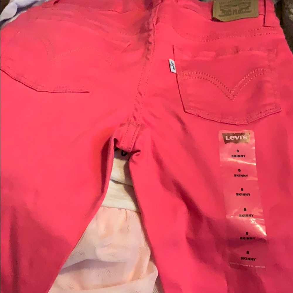 Girl size 8 Levis in Pink. New!
